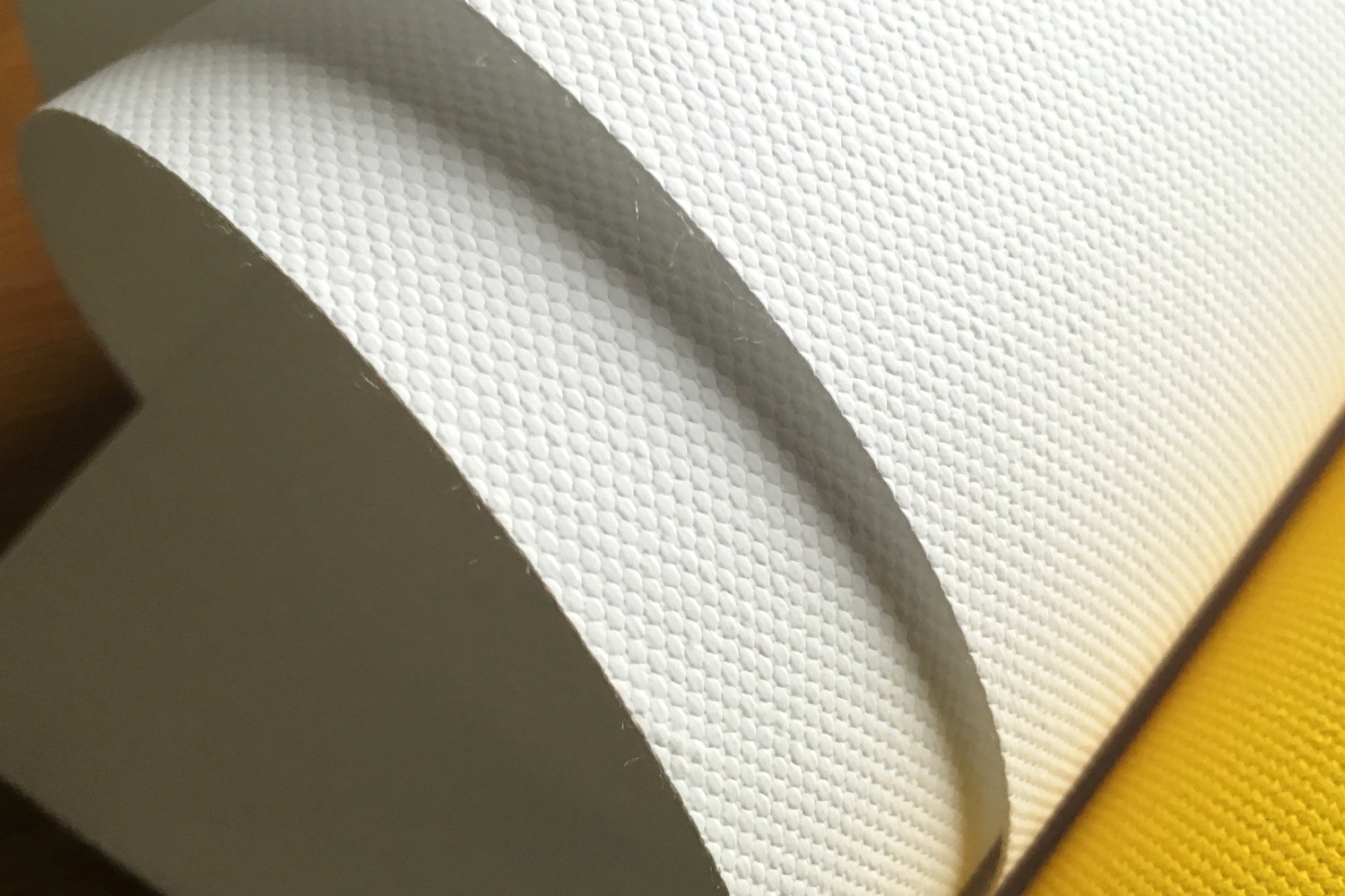 Close-up of coated printable canvas surface for aqueous pigment ink printing