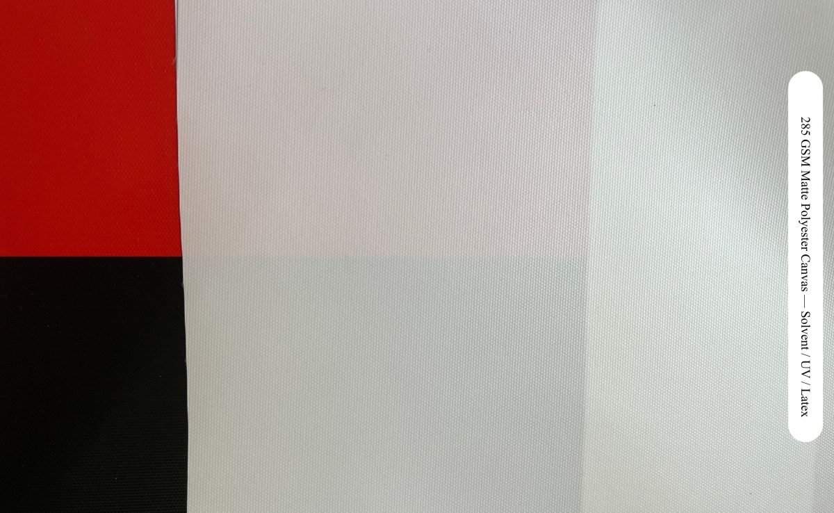 285 GSM matte polyester printable canvas opacity over red, white and black backgrounds