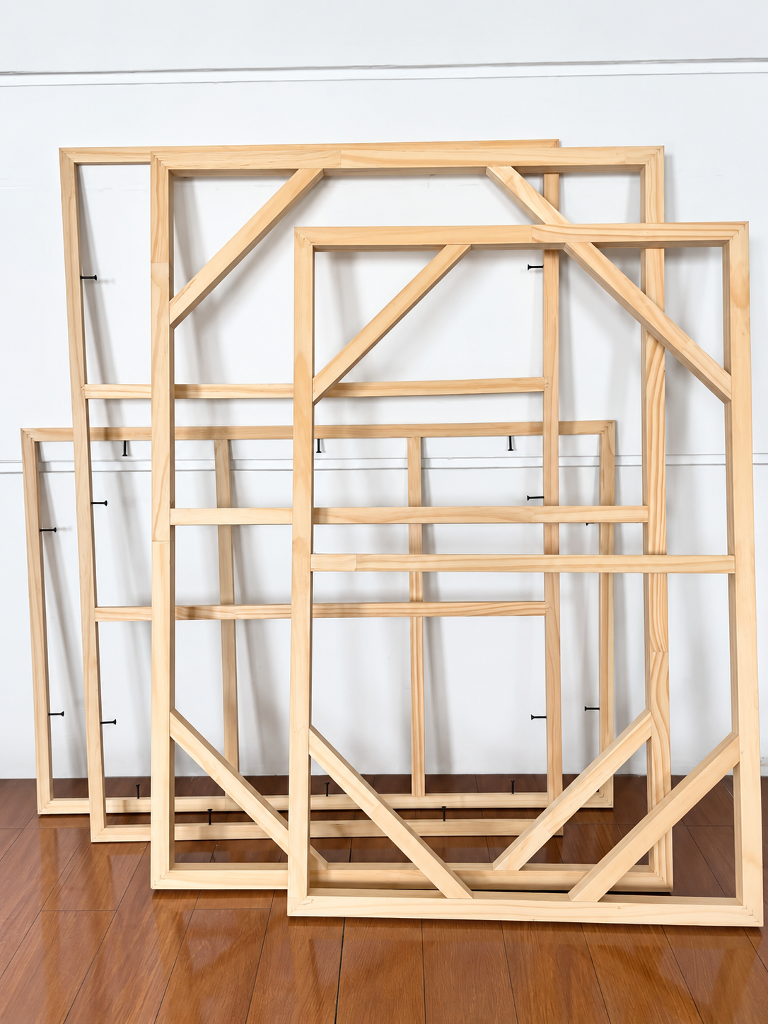 Canvas stretcher frame support configurations with centre bar cross brace and multiple braces